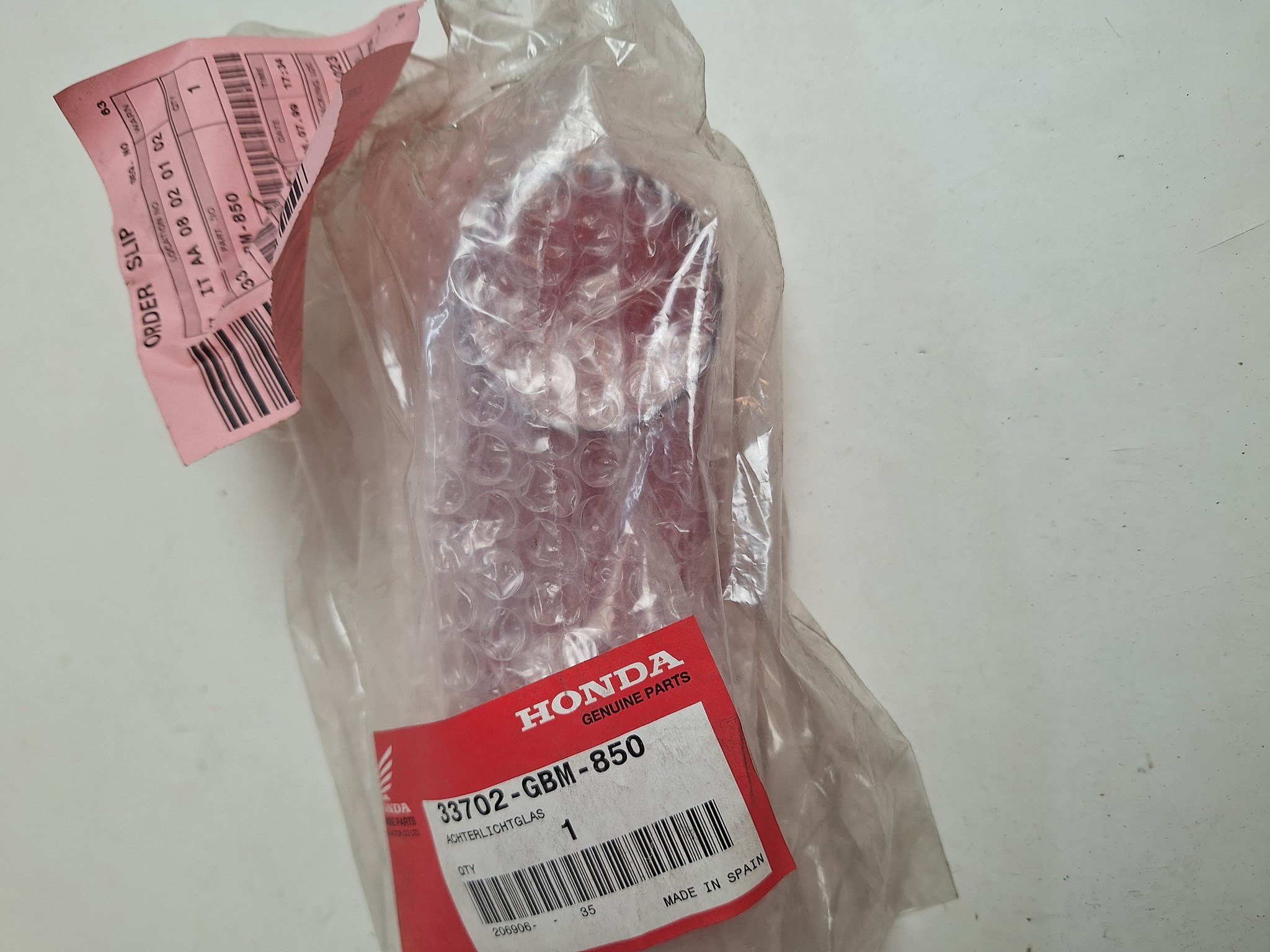 Picture of LENS TAILLIGHT  33702-GBM-850